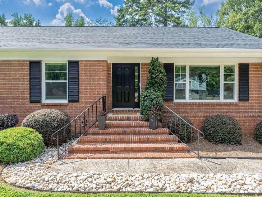 7735 Surreywood Place, Charlotte, NC 28270.  MLS# CAR4418126, YatesRealty ID 50199. Front entry with brick steps