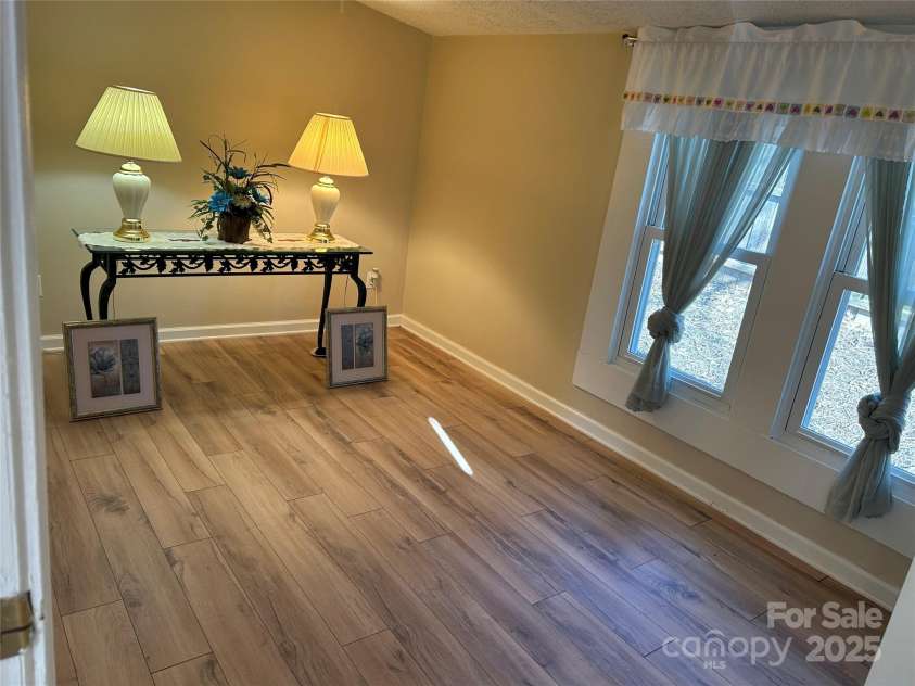 211 Aycock Avenue, Hendersonville, NC 28792.  MLS# CAR4216559, YatesRealty ID 502. Primary Bedroom