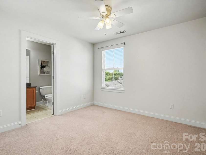 13913 Helen Benson Boulevard, Davidson, NC 28036.  MLS# CAR4418456, YatesRealty ID 50201. Back secondary bedroom