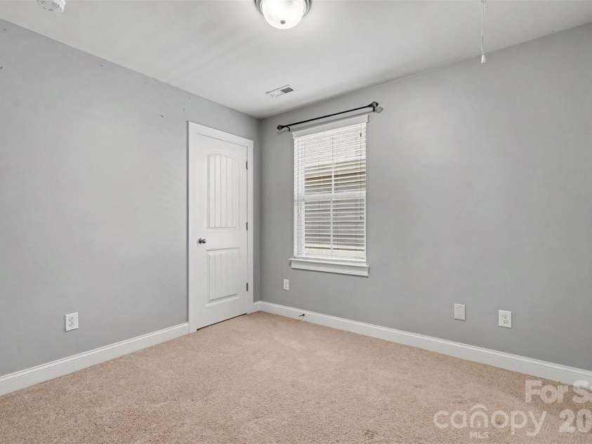 13913 Helen Benson Boulevard, Davidson, NC 28036.  MLS# CAR4418456, YatesRealty ID 50201. Middle secondary bedroom