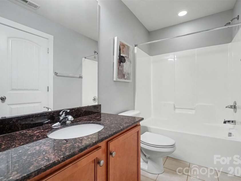 13913 Helen Benson Boulevard, Davidson, NC 28036.  MLS# CAR4418456, YatesRealty ID 50201. Primary Bathroom
