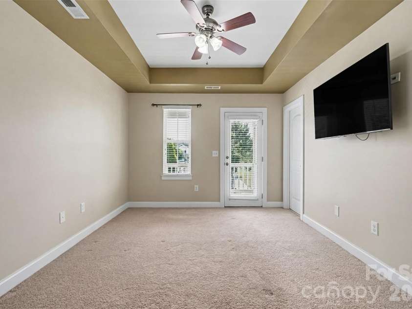 13913 Helen Benson Boulevard, Davidson, NC 28036.  MLS# CAR4418456, YatesRealty ID 50201. Primary Bedroom with access to private covered front porch