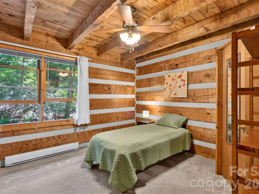 50 Cherokee Lane, Swannanoa, NC 28778.  MLS# CAR4418534, YatesRealty ID 50202. Bedroom with private bathroom.