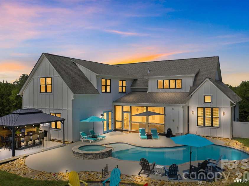 116 Burley Drive, Mooresville, NC 28115.  MLS# CAR4402820, YatesRealty ID 50204. Back Evening