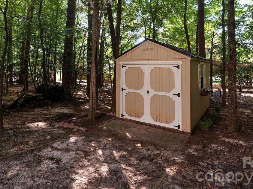 7786 Chapel Creek Drive, Denver, NC 28037.  MLS# CAR4407968, YatesRealty ID 50207. New shed...