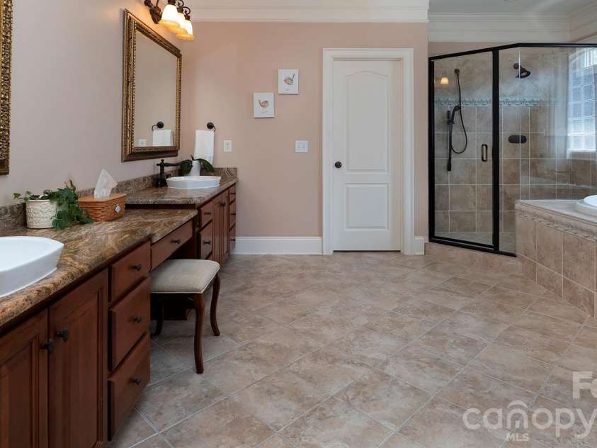 7786 Chapel Creek Drive, Denver, NC 28037.  MLS# CAR4407968, YatesRealty ID 50207. Primary bathroom with dual sinks...
