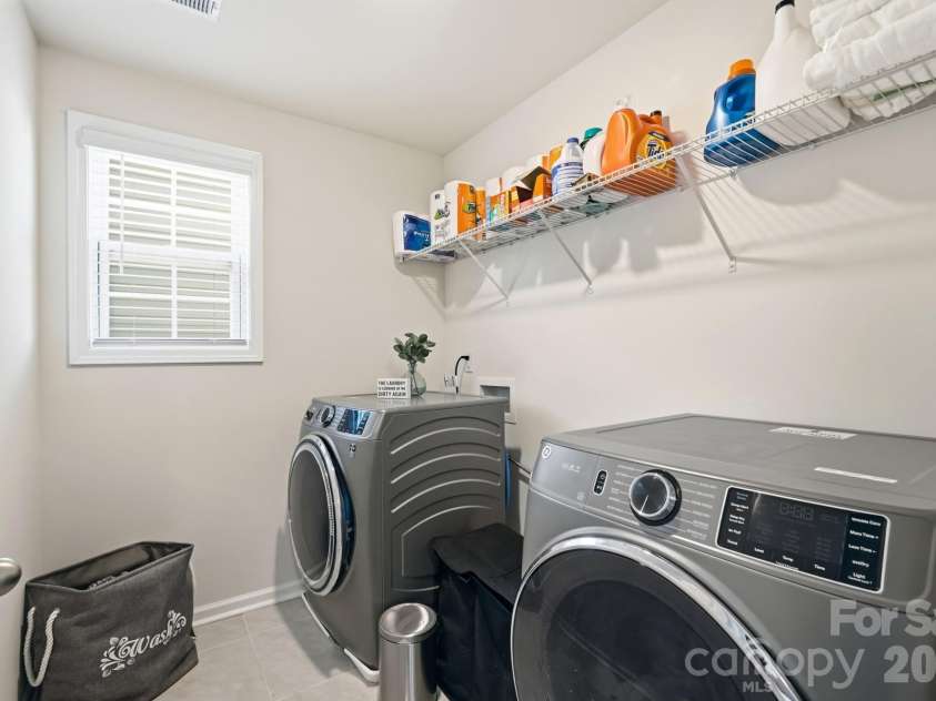 6013 Redwood Pine Road, Concord, NC 28027.  MLS# CAR4416660, YatesRealty ID 50208. 2nd floor laundry room