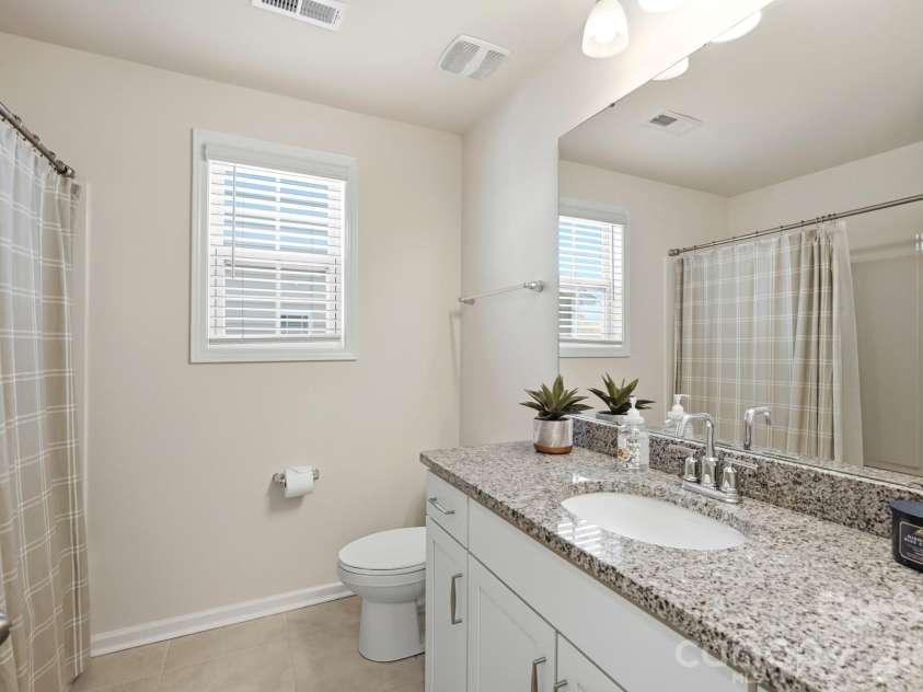 6013 Redwood Pine Road, Concord, NC 28027.  MLS# CAR4416660, YatesRealty ID 50208. Guest bathroom 2nd floor