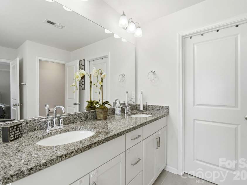 6013 Redwood Pine Road, Concord, NC 28027.  MLS# CAR4416660, YatesRealty ID 50208. With double vanity and walk in Closet