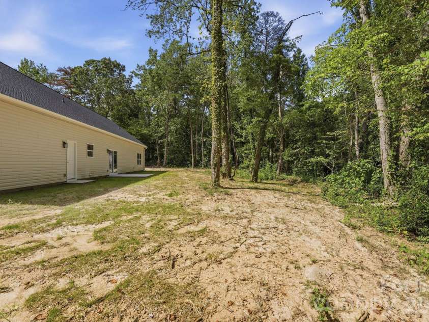 111 General AS Johnston Street, Stanley, NC 28164.  MLS# CAR4413551, YatesRealty ID 50216. Backyard