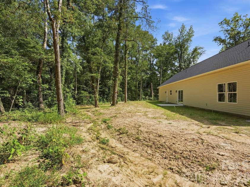 111 General AS Johnston Street, Stanley, NC 28164.  MLS# CAR4413551, YatesRealty ID 50216. Backyard