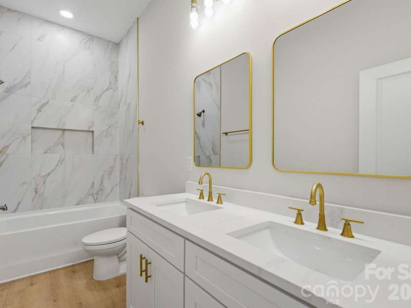 111 General AS Johnston Street, Stanley, NC 28164.  MLS# CAR4413551, YatesRealty ID 50216. Guest Bathroom