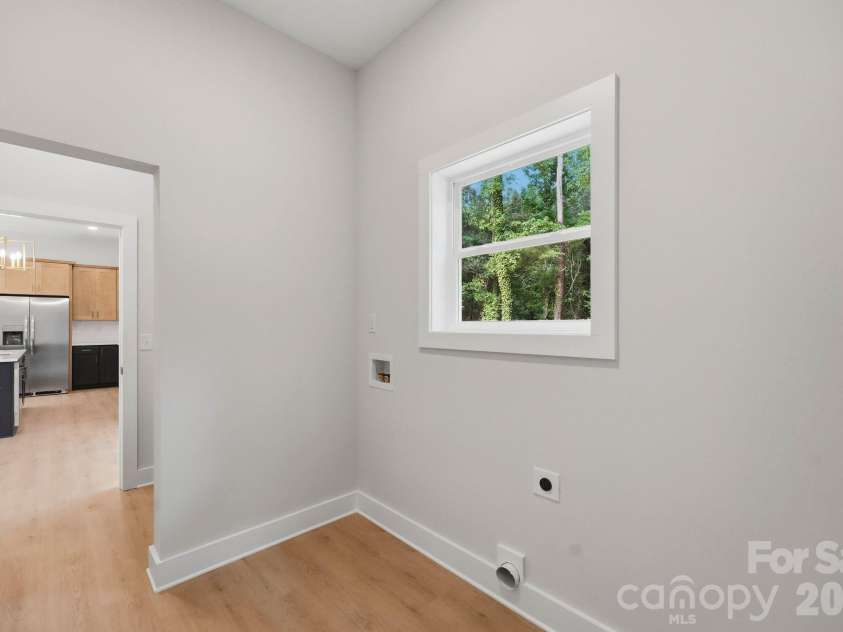 111 General AS Johnston Street, Stanley, NC 28164.  MLS# CAR4413551, YatesRealty ID 50216. Laundry Room