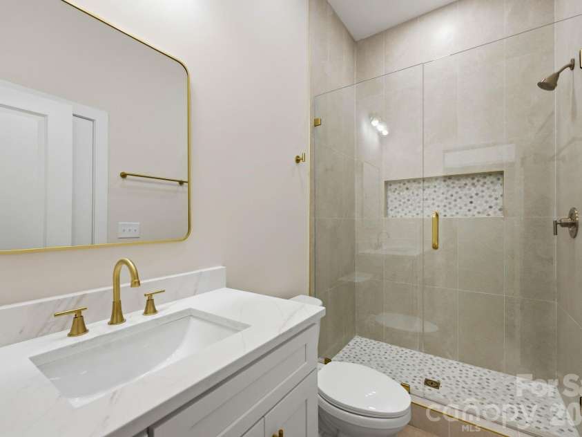 111 General AS Johnston Street, Stanley, NC 28164.  MLS# CAR4413551, YatesRealty ID 50216. Primary Bathroom