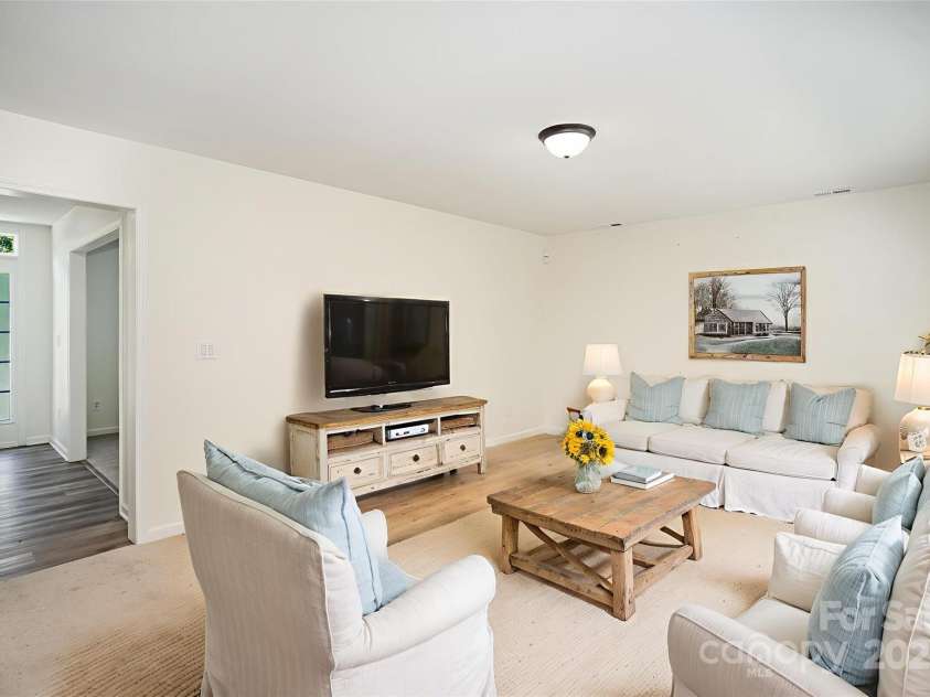 9146 Austin Ridge Lane, Charlotte, NC 28214.  MLS# CAR4297470, YatesRealty ID 5022. Family Room *Virtually Staged*