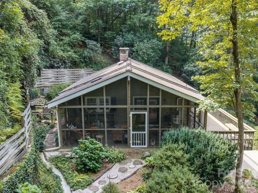 113 Riverside Estate Road, Brevard, NC 28712.  MLS# CAR4420795, YatesRealty ID 50222. 