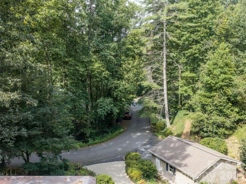 113 Riverside Estate Road, Brevard, NC 28712.  MLS# CAR4420795, YatesRealty ID 50222. 