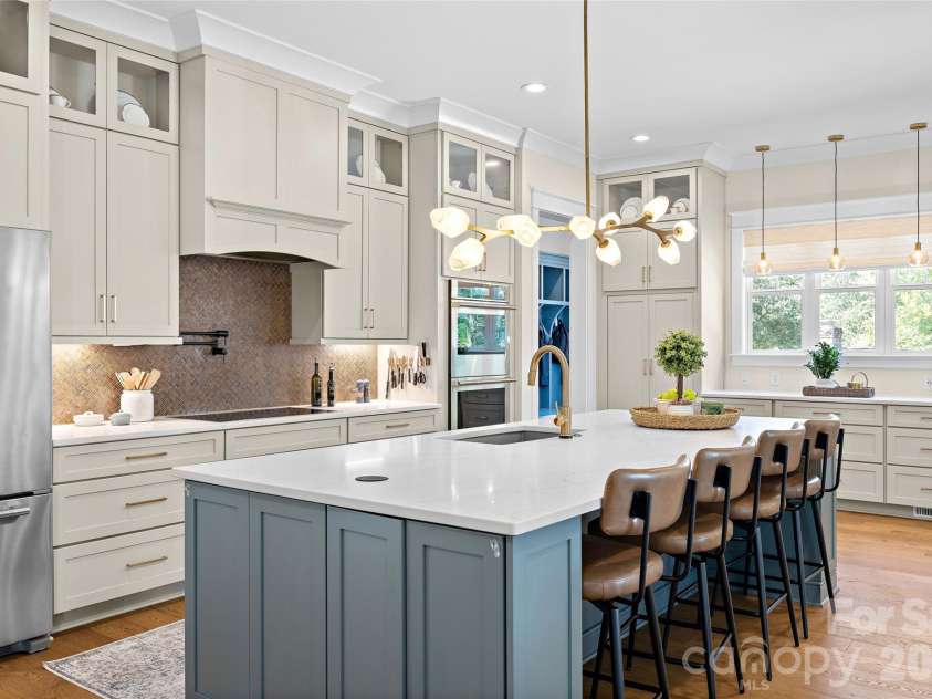 2511 Tower Court, Charlotte, NC 28209.  MLS# CAR4415814, YatesRealty ID 50224. Massive kitchen island with touchless sink