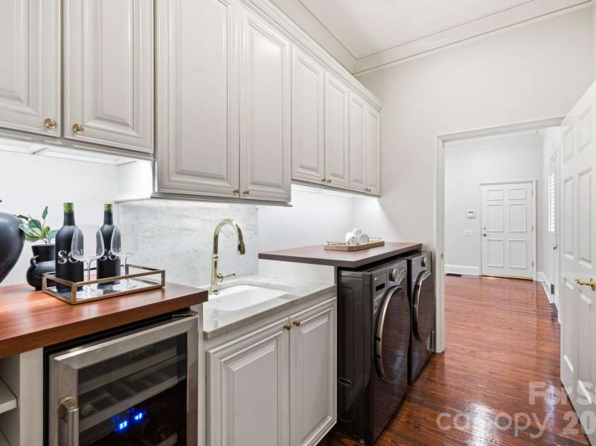 4935 Piper Glen Drive, Charlotte, NC 28277.  MLS# CAR4417879, YatesRealty ID 50231. Laundry Room