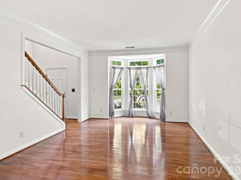 10309 Elven Lane, Charlotte, NC 28269.  MLS# CAR4423186, YatesRealty ID 50243. Front room