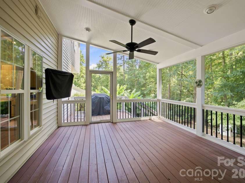 10309 Elven Lane, Charlotte, NC 28269.  MLS# CAR4423186, YatesRealty ID 50243. Screened-in deck