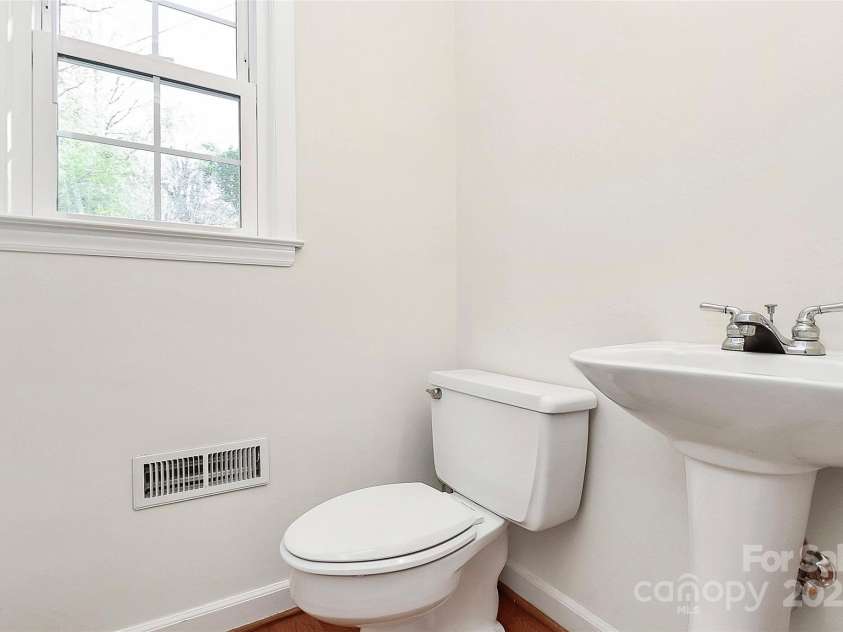 7501 Folger Drive, Charlotte, NC 28226.  MLS# CAR4325075, YatesRealty ID 50246. Half bath near kitchen and side entrance