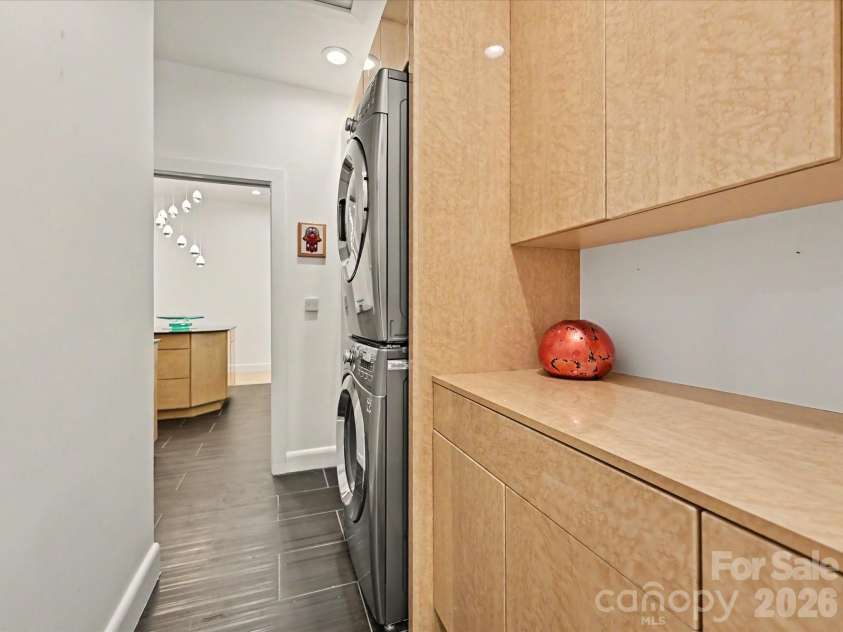 127 Tryon Street, Charlotte, NC 28202.  MLS# CAR4388173, YatesRealty ID 5025. Laundry Room looking into Kitchen