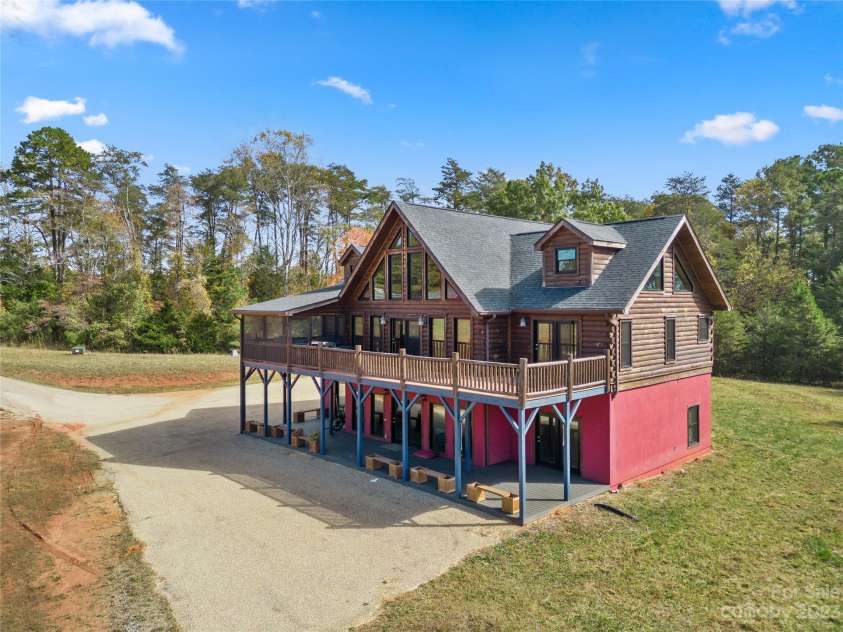 1642 Smith Waldrop Road, Mill Spring, NC 28756.  MLS# CAR4089037, YatesRealty ID 5025. 7 bedroom Log Home