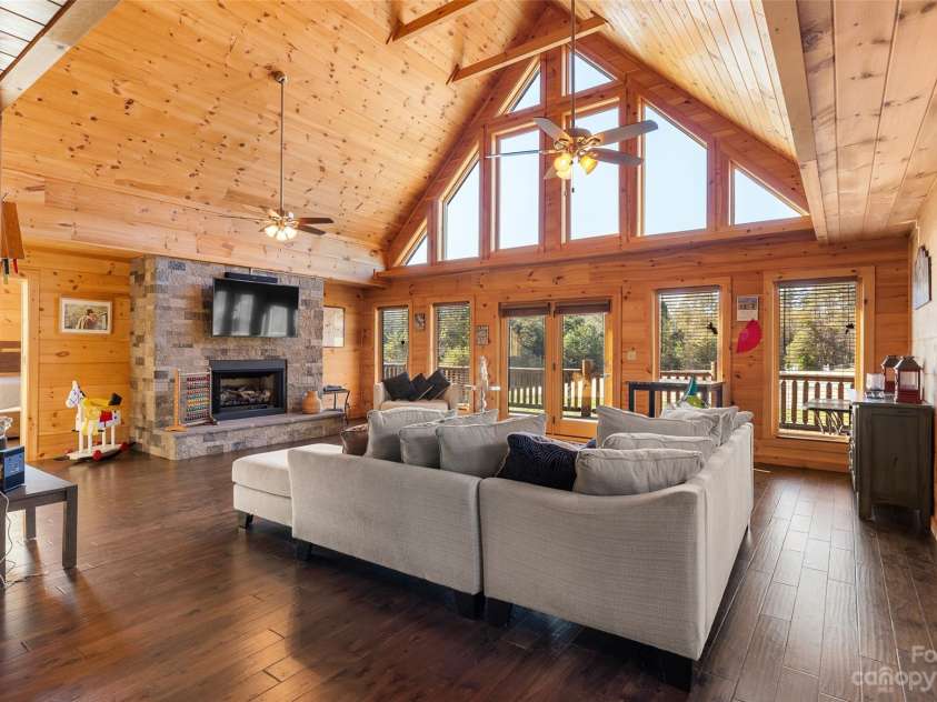 1642 Smith Waldrop Road, Mill Spring, NC 28756.  MLS# CAR4089037, YatesRealty ID 5025. Family Room Fireplace