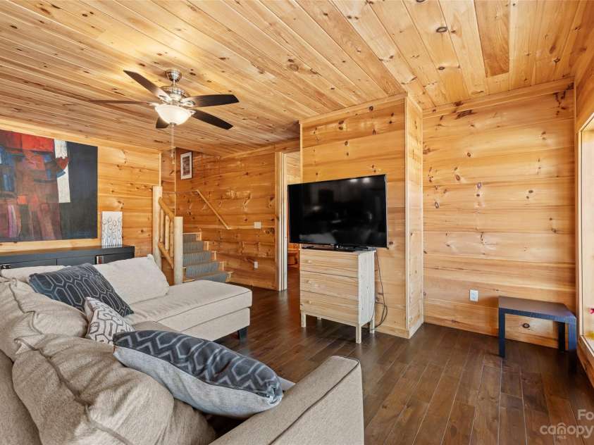 1642 Smith Waldrop Road, Mill Spring, NC 28756.  MLS# CAR4089037, YatesRealty ID 5025. Lower Level Family Area