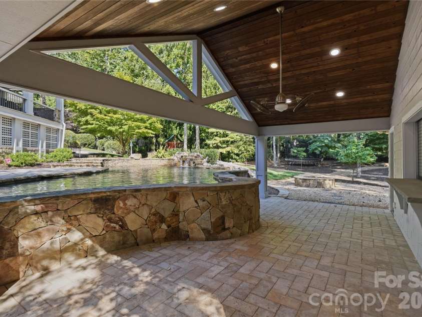 6239 Sharon Hills Road, Charlotte, NC 28210.  MLS# CAR4423022, YatesRealty ID 50254. Covered Poolside Cabana w/ Kitchen and bathroom