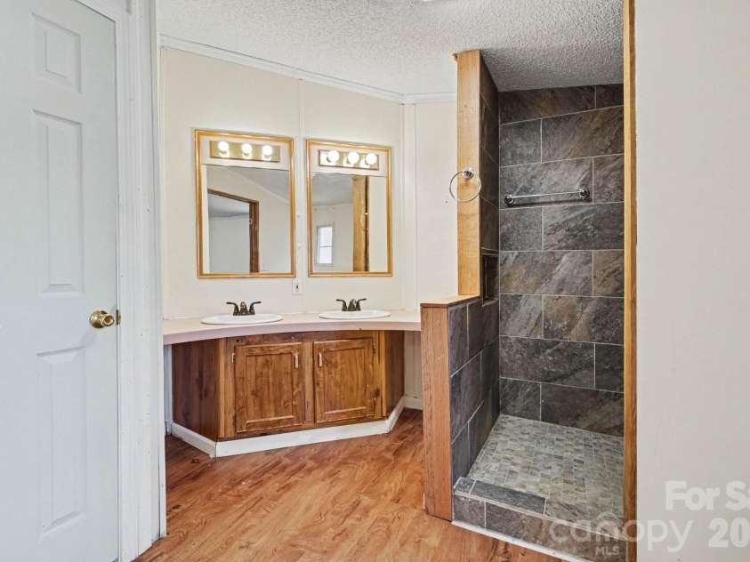 530 Gladstone Road, Mocksville, NC 27028.  MLS# CAR4423690, YatesRealty ID 50260. Primary Bath