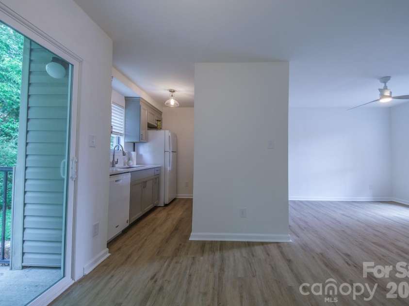 11022 Running Ridge Road, Charlotte, NC 28226.  MLS# CAR4422317, YatesRealty ID 50264. Kitchen, Dining and Back Patio