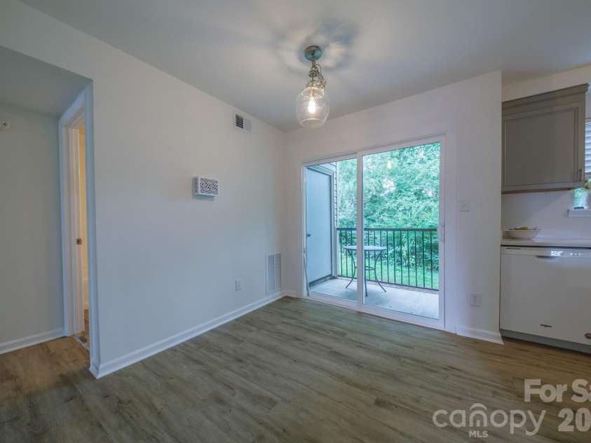 11022 Running Ridge Road, Charlotte, NC 28226.  MLS# CAR4422317, YatesRealty ID 50264. Kitchen, dining, Patio and Hall