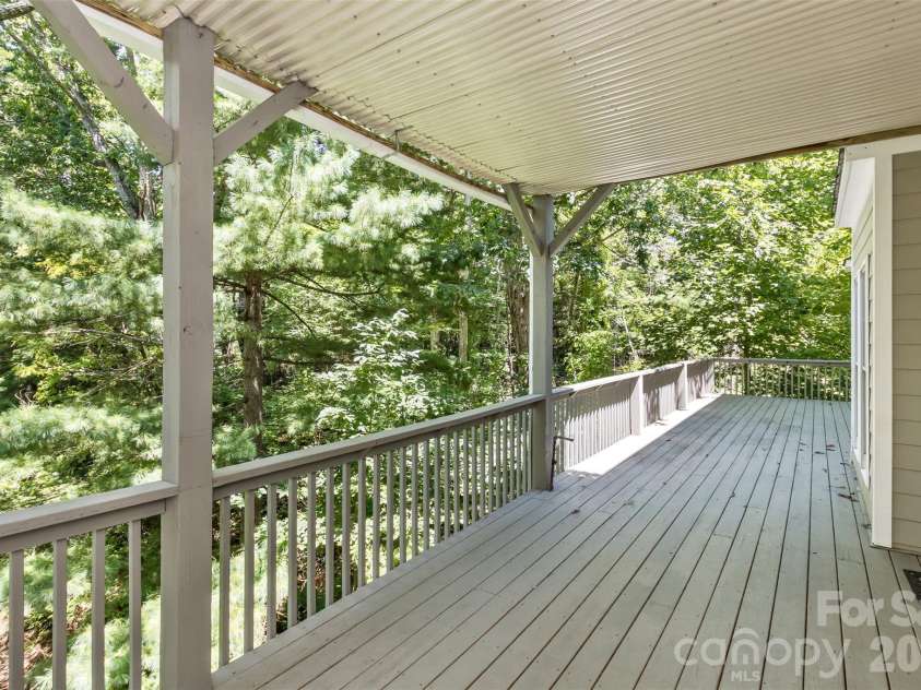 113 Ballantree Drive, Asheville, NC 28803.  MLS# CAR4417051, YatesRealty ID 50269. Partially Covered Deck off the living room