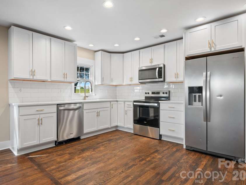 1975 Three Forks Church Road, Taylorsville, NC 28681.  MLS# CAR4423348, YatesRealty ID 50270. Kitchen