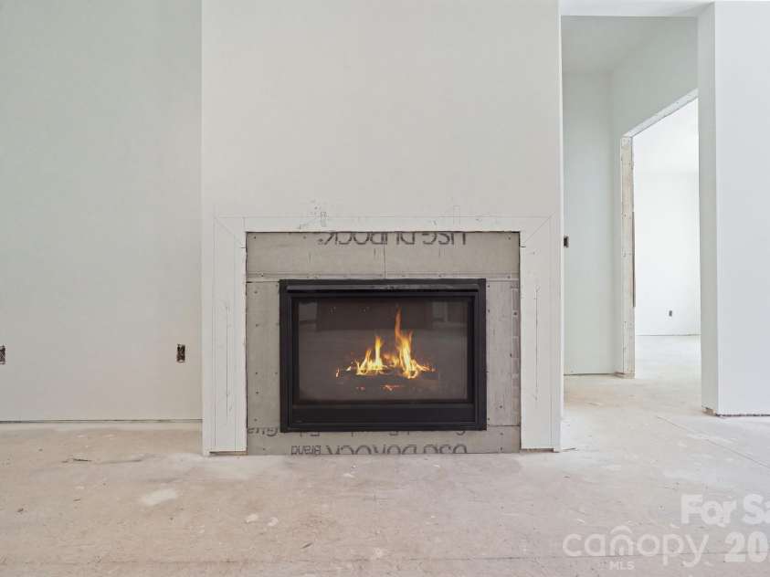 6395 Wingate Hill Road, Denver, NC 28037.  MLS# CAR4423290, YatesRealty ID 50281. Cozy electric fireplace!