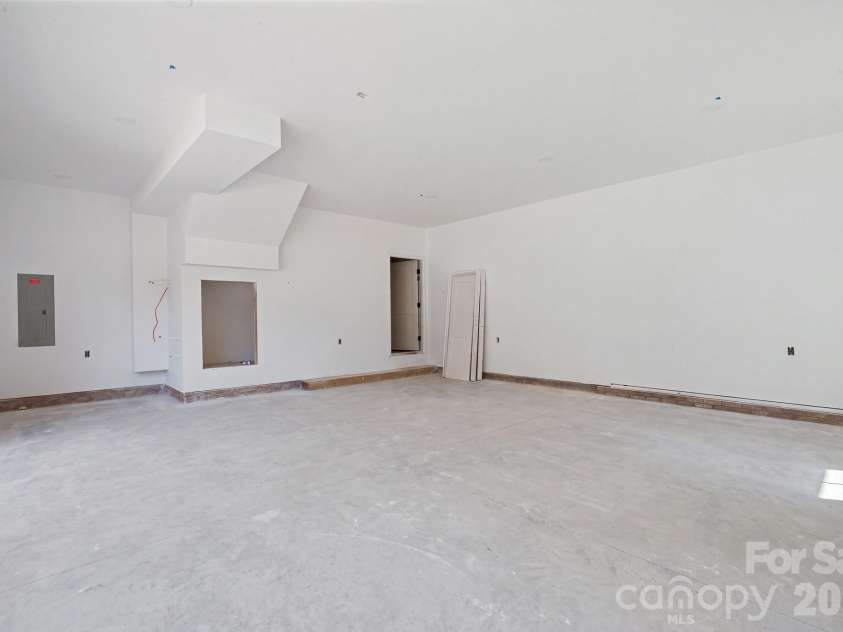 6395 Wingate Hill Road, Denver, NC 28037.  MLS# CAR4423290, YatesRealty ID 50281. Oversized 2 car garage with enough room for lawn mower/motorcycle, or extras.