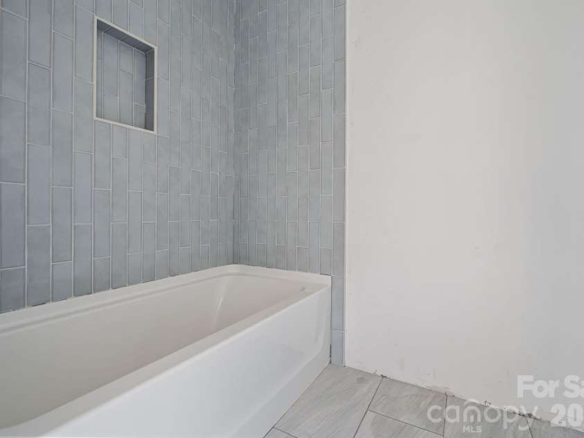 6395 Wingate Hill Road, Denver, NC 28037.  MLS# CAR4423290, YatesRealty ID 50281. Private upper full bath with gorgeous tile!