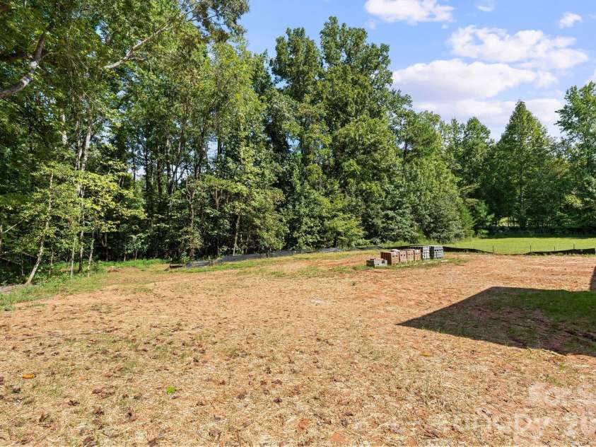 6395 Wingate Hill Road, Denver, NC 28037.  MLS# CAR4423290, YatesRealty ID 50281. This open backyard has room for a pool.