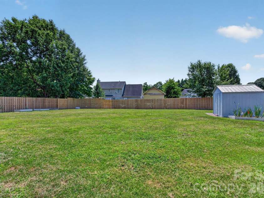 906 Woodhill Drive, Fletcher, NC 28732.  MLS# CAR4404575, YatesRealty ID 50283. Fully Fenced Backyard