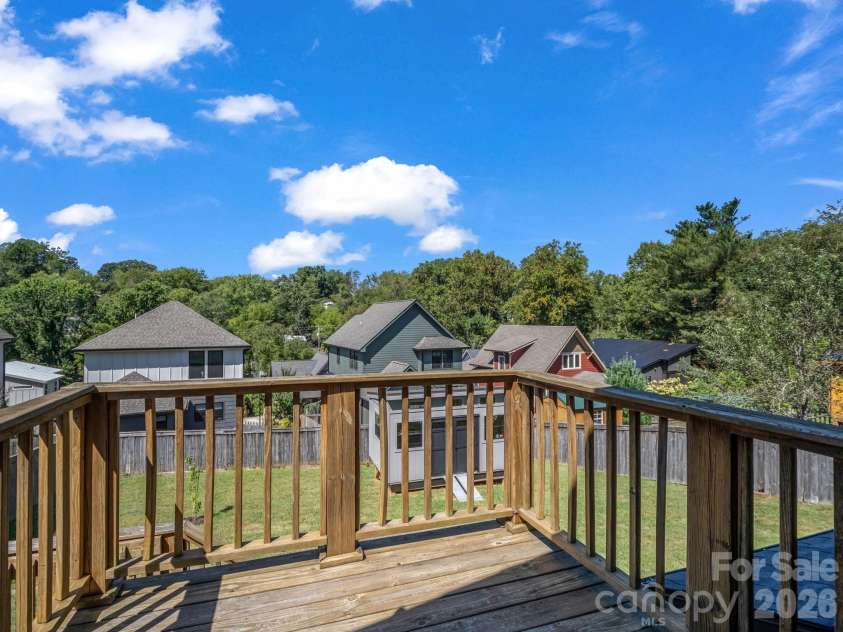 10 Dale Street, Asheville, NC 28806.  MLS# CAR4421606, YatesRealty ID 50294. Exterior deck from main level, overlooking backyard
