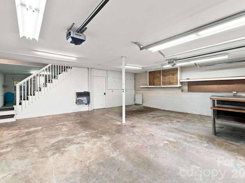 95 Holly Ridge Road, Waynesville, NC 28786.  MLS# CAR4423119, YatesRealty ID 50306. Double Garage with ample storage.