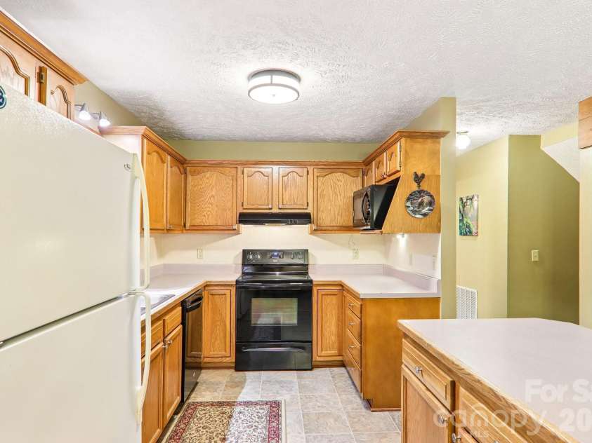 36 Nicholas Lane, Maggie Valley, NC 28751.  MLS# CAR4422932, YatesRealty ID 50311. Kitchen