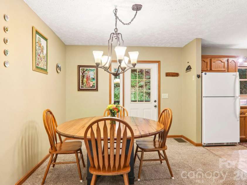 36 Nicholas Lane, Maggie Valley, NC 28751.  MLS# CAR4422932, YatesRealty ID 50311. Kitchen eating area