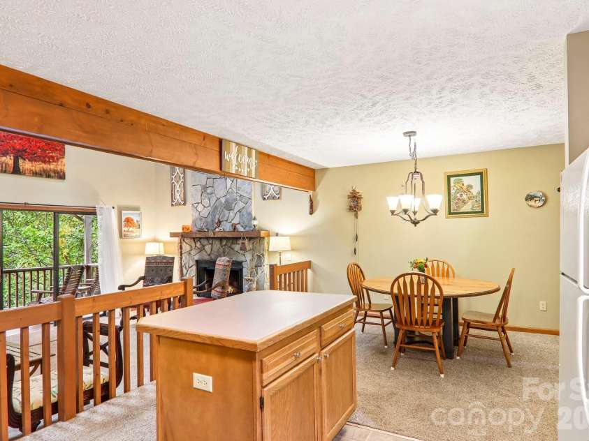36 Nicholas Lane, Maggie Valley, NC 28751.  MLS# CAR4422932, YatesRealty ID 50311. Kitchen island