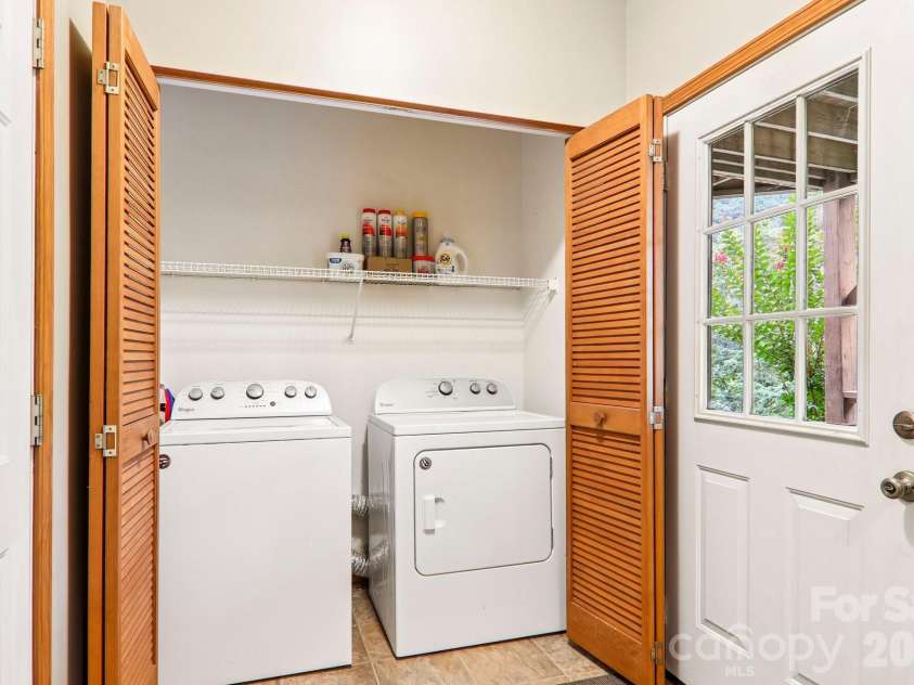 36 Nicholas Lane, Maggie Valley, NC 28751.  MLS# CAR4422932, YatesRealty ID 50311. Llaundry area