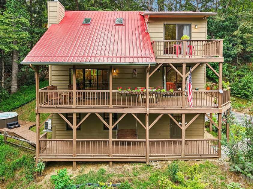 36 Nicholas Lane, Maggie Valley, NC 28751.  MLS# CAR4422932, YatesRealty ID 50311. Private hot tub on left