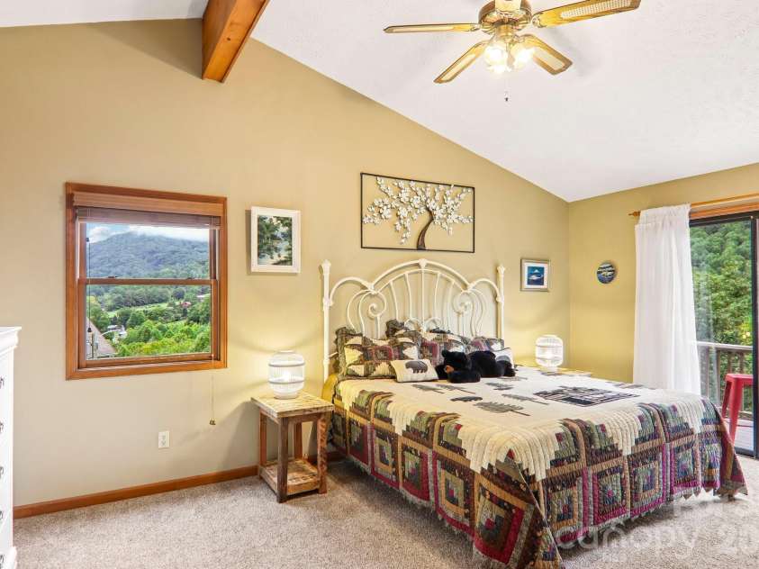 36 Nicholas Lane, Maggie Valley, NC 28751.  MLS# CAR4422932, YatesRealty ID 50311. Upstairs primary bedroom #1