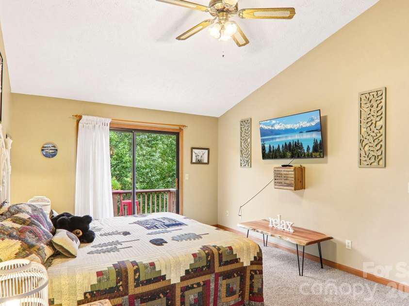 36 Nicholas Lane, Maggie Valley, NC 28751.  MLS# CAR4422932, YatesRealty ID 50311. Upstairs primary bedroom #1
